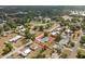 Aerial shot of the property, highlighting its location within a friendly community with nearby amenities at 455 W Plumosa St, Bartow, FL 33830