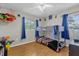 Bright bedroom featuring a bunk bed, wood floors, and natural light at 455 W Plumosa St, Bartow, FL 33830