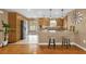Modern kitchen featuring stainless steel appliances, granite countertops, and a sliding door to the patio at 455 W Plumosa St, Bartow, FL 33830