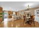 Open-concept kitchen with a breakfast bar, ample cabinet space, and seamless flow to the dining area at 455 W Plumosa St, Bartow, FL 33830