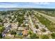 Aerial view of a quaint residential neighborhood with backyard pools and easy highway access at 4727 Wales St, Lake Wales, FL 33859