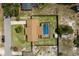 Bird's eye view of a home with a screened-in pool, and spacious backyard within a fenced perimeter at 4727 Wales St, Lake Wales, FL 33859