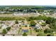 Aerial view displays a fenced backyard pool, easy highway access, and shopping opportunities at 4727 Wales St, Lake Wales, FL 33859