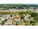 Aerial view outlining the home, featuring fenced backyard pool, and convenient highway access at 4727 Wales St, Lake Wales, FL 33859