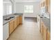 Clean kitchen featuring tile floor, modern appliances, and lots of cabinet space at 6354 Sedgeford Dr, Lakeland, FL 33811