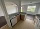Bright kitchen with granite countertops, wooden cabinets, and stainless steel appliances at 6354 Sedgeford Dr, Lakeland, FL 33811