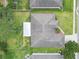 Aerial view of the house with a well-maintained backyard at 6523 Evergreen Park Dr, Lakeland, FL 33813