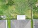 Aerial view of a backyard featuring lush lawn and a storage shed at 6523 Evergreen Park Dr, Lakeland, FL 33813