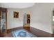 Spacious living area with hardwood floors and an archway leading to the kitchen at 6523 Evergreen Park Dr, Lakeland, FL 33813