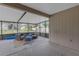 Screened patio showcasing a seating area, and a view of the landscaped backyard and neighborhood at 6523 Evergreen Park Dr, Lakeland, FL 33813