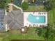 Aerial image of the community pool and playground, featuring ample amenities for residents at 6523 Evergreen Park Dr, Lakeland, FL 33813