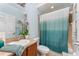 Bright bathroom with a vanity, sink, toilet, and a shower-tub combo at 2721 Stonewood Dr, Lakeland, FL 33810