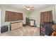 Neutral-toned bedroom with carpet flooring, offering two cribs and dresser at 2721 Stonewood Dr, Lakeland, FL 33810