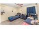 Bright bedroom featuring two twin beds with built-in storage and playful decor at 2721 Stonewood Dr, Lakeland, FL 33810