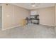 Bedroom featuring carpet, a desk, and a window with an aquarium at 2721 Stonewood Dr, Lakeland, FL 33810