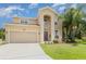 Charming two-story home with well-maintained lawn and two car garage at 2721 Stonewood Dr, Lakeland, FL 33810