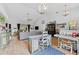 Spacious living room with high ceilings, wood floors, and an abundance of natural light at 6442 Bendelow Dr, Lakeland, FL 33810