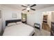 Cozy bedroom with queen-size bed, closet, and neutral decor for a relaxing retreat at 1820 N Merrick Dr, Deltona, FL 32738