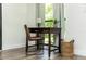 Cozy desk area with a comfortable chair, a small lamp, and a view to the exterior at 1820 N Merrick Dr, Deltona, FL 32738