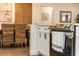 Modern kitchen showcasing stainless steel appliances, sleek white cabinetry, and stylish hardware at 1820 N Merrick Dr, Deltona, FL 32738
