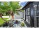 Close up view of the front of the home showing landscaping and a brick exterior at 1820 N Merrick Dr, Deltona, FL 32738