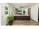Spacious living room with modern furnishings, wood floors, and lots of natural light at 1820 N Merrick Dr, Deltona, FL 32738
