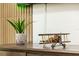 Close up of a model airplane on a credenza below a wall mounted television at 1820 N Merrick Dr, Deltona, FL 32738