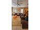 Comfortable living room features a plush sofa, decorative pillows, and stylish accents at 153 Tigerlily Ct, Davenport, FL 33837