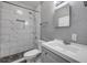 Stylish bathroom with modern fixtures, including a vanity, toilet, and shower at 110 E Lauren Ct, Fern Park, FL 32730