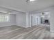 Open-concept living space with stylish flooring, recessed lighting, and neutral gray walls at 110 E Lauren Ct, Fern Park, FL 32730