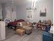 Living room with ceiling fan, various furniture, and unique decor at 110 E Lauren Ct, Fern Park, FL 32730