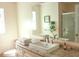 Bright bathroom features a large vanity, ample countertop space, and a walk-in shower at 20732 Sw Marine Blvd, Dunnellon, FL 34431