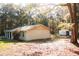A charming single-story home with a carport, mature landscaping and a sprawling backyard at 20732 Sw Marine Blvd, Dunnellon, FL 34431