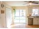 Charming kitchen with a stainless steel dishwasher, sliding glass doors to the backyard at 20732 Sw Marine Blvd, Dunnellon, FL 34431