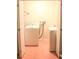 Compact laundry room with a white washer and dryer at 20732 Sw Marine Blvd, Dunnellon, FL 34431