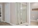 Bathroom with a glass door shower and white trim at 460 Tess Ct, Orlando, FL 32834