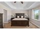 Spacious main bedroom with a trey ceiling, neutral tones, and a window seat that offers a relaxing space at 460 Tess Ct, Orlando, FL 32834