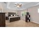 Inviting main bedroom featuring a trey ceiling, large windows and warm carpet for a cozy retreat at 460 Tess Ct, Orlando, FL 32834
