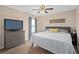 Bedroom featuring carpet flooring, a ceiling fan and soft neutral walls at 460 Tess Ct, Orlando, FL 32834