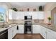Bright and clean kitchen featuring stainless steel appliances and granite countertops adding elegance at 460 Tess Ct, Orlando, FL 32834