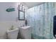 Cozy bathroom with a beach theme and updated fixtures at 5932 Hilltop E Ln, Lakeland, FL 33809