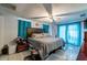 Inviting bedroom with natural lighting, comfortable bedding, and a relaxing atmosphere at 5932 Hilltop E Ln, Lakeland, FL 33809