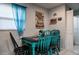 Dining area with blue accents, a charming dining table, and a view of the outdoors at 5932 Hilltop E Ln, Lakeland, FL 33809