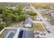 A residential neighborhood with a home that has a new roof, well-kept landscaping, and a driveway at 2769 Corrigan Dr, Deltona, FL 32738