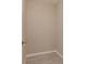 Neutral toned bathroom features textured walls and grey flooring at 2769 Corrigan Dr, Deltona, FL 32738