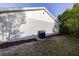 View of the home's exterior and central air conditioning unit at 2769 Corrigan Dr, Deltona, FL 32738