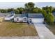 Charming single-story home with a well-manicured lawn and a two-car garage at 2769 Corrigan Dr, Deltona, FL 32738