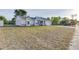 Quaint single-Gathering house with a spacious lawn, driveway, and attached garage, ideal for suburban living at 2769 Corrigan Dr, Deltona, FL 32738