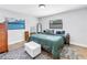 Cozy bedroom with natural light, a comfortable bed, and stylish decor creates a relaxing atmosphere at 4821 S Gachet Blvd, Lakeland, FL 33813