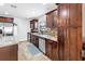 The kitchen features stainless steel appliances, modern cabinets, and a lovely decorative backsplash at 4821 S Gachet Blvd, Lakeland, FL 33813